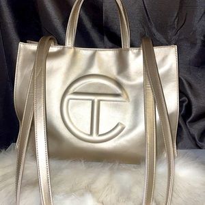 Telfar medium gold shopping bag